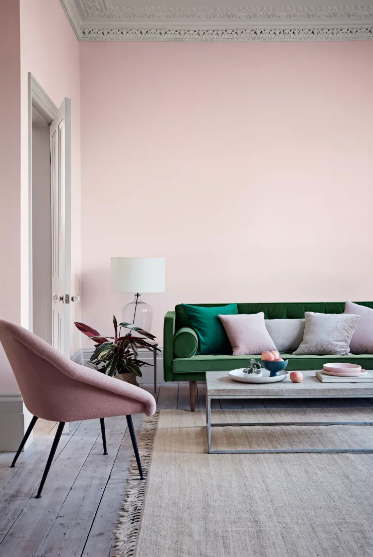 green couch living room ideas with pink blush backround