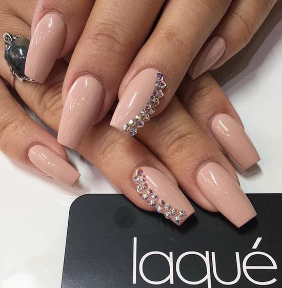 nude nail trend with jewels