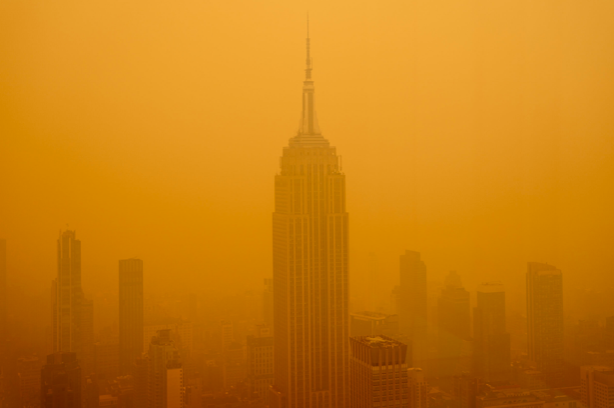 Smoky haze from Canadian wildfires engulfs New York City and diminishes the visibility of the Empire State Building on June 7, 2023 | David Dee Delgado/Getty Images
